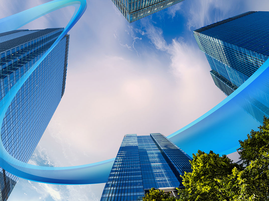 Skyscrapers and blue sky with graphical swoosh across the sky