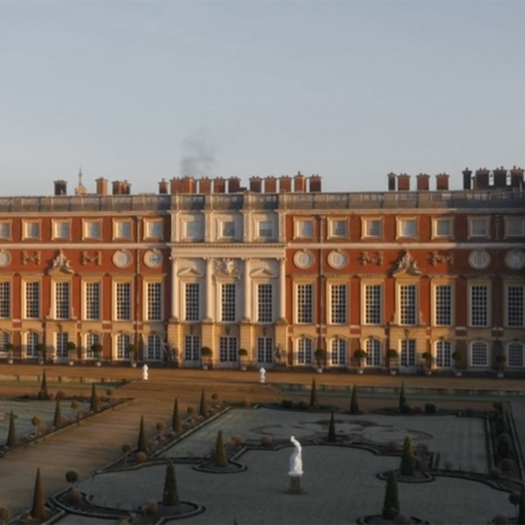 Woman holding tablet at Hampton Court Palace